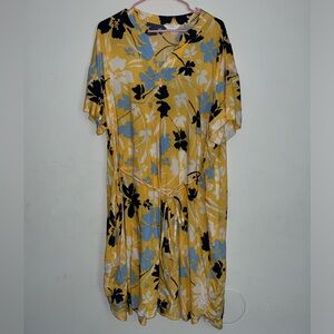 Women’s yellow floral dress.